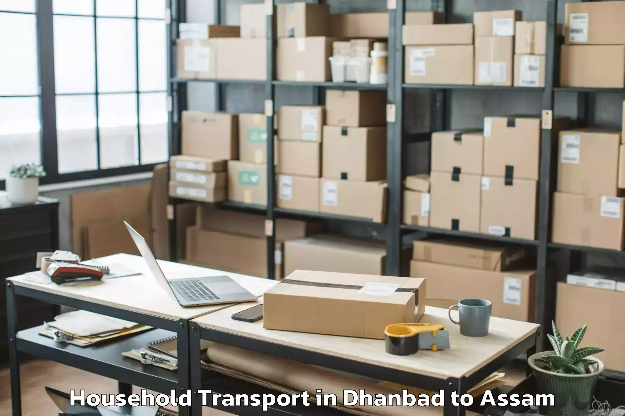 Reliable Dhanbad to Duliajan Household Transport